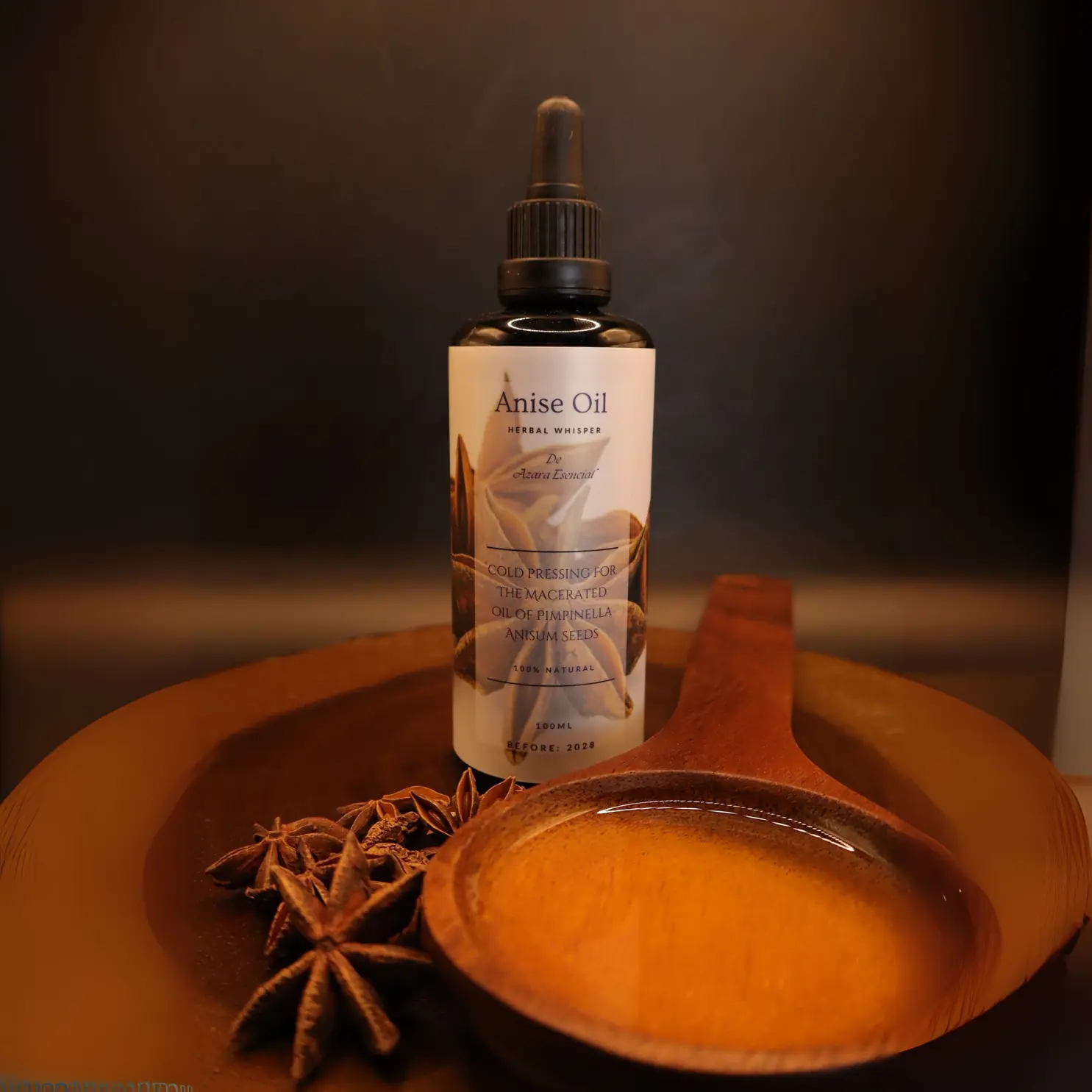 wooden-spoon-full-of-anise-oil- product shot with the bottle of Anise oil in black background BY- azara natural