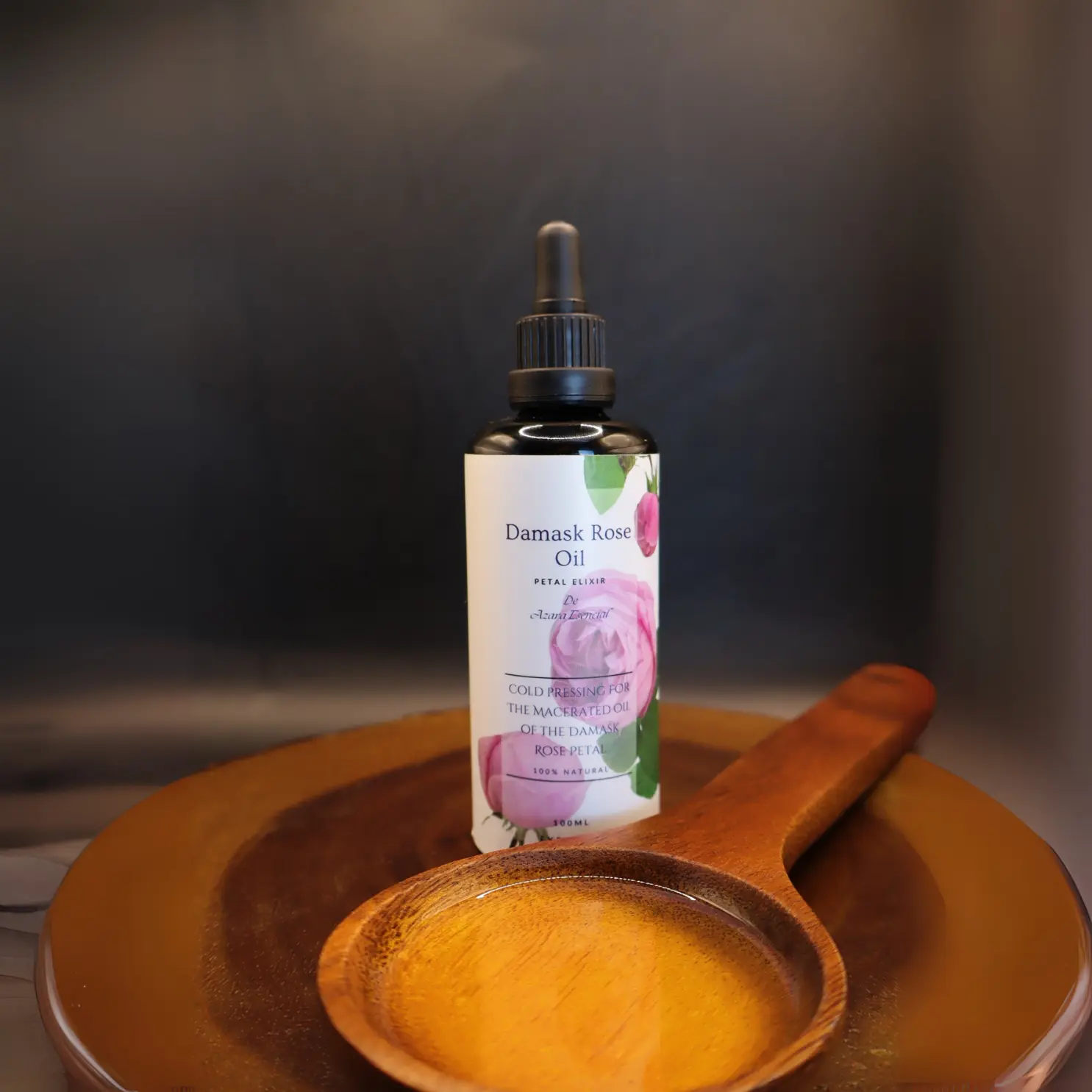 damask-rose-oil by azara natural with black background product shot