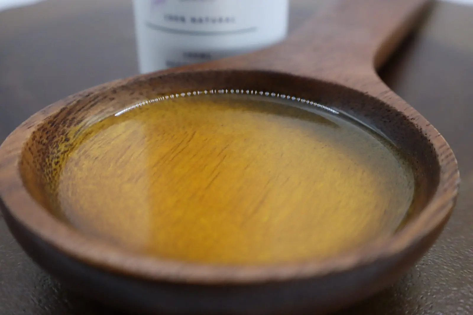 deco-wooden-spoon-full-of-natural-cold-pressed-radish-oil-BY azara natural