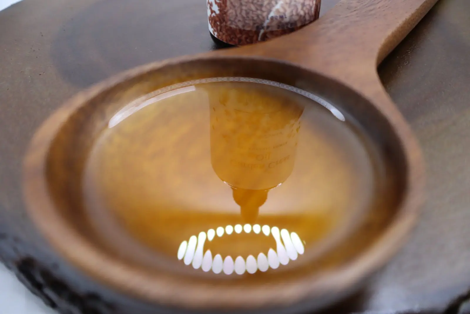 decorative-wooden-spoon-full-of-garden-cress-natural-oil-By azara natural